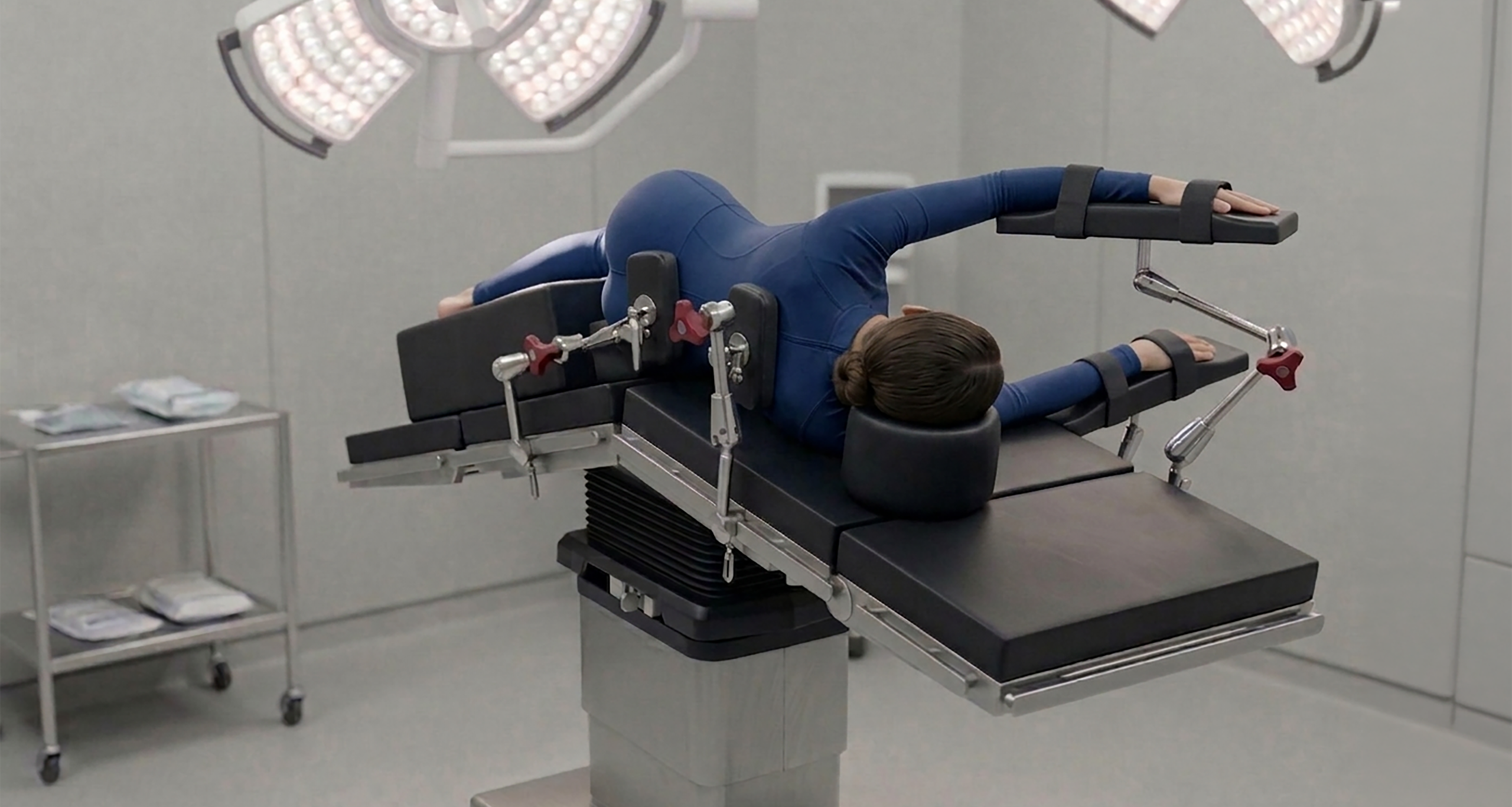 FIXED patient position-3 woman blue jumpsuit